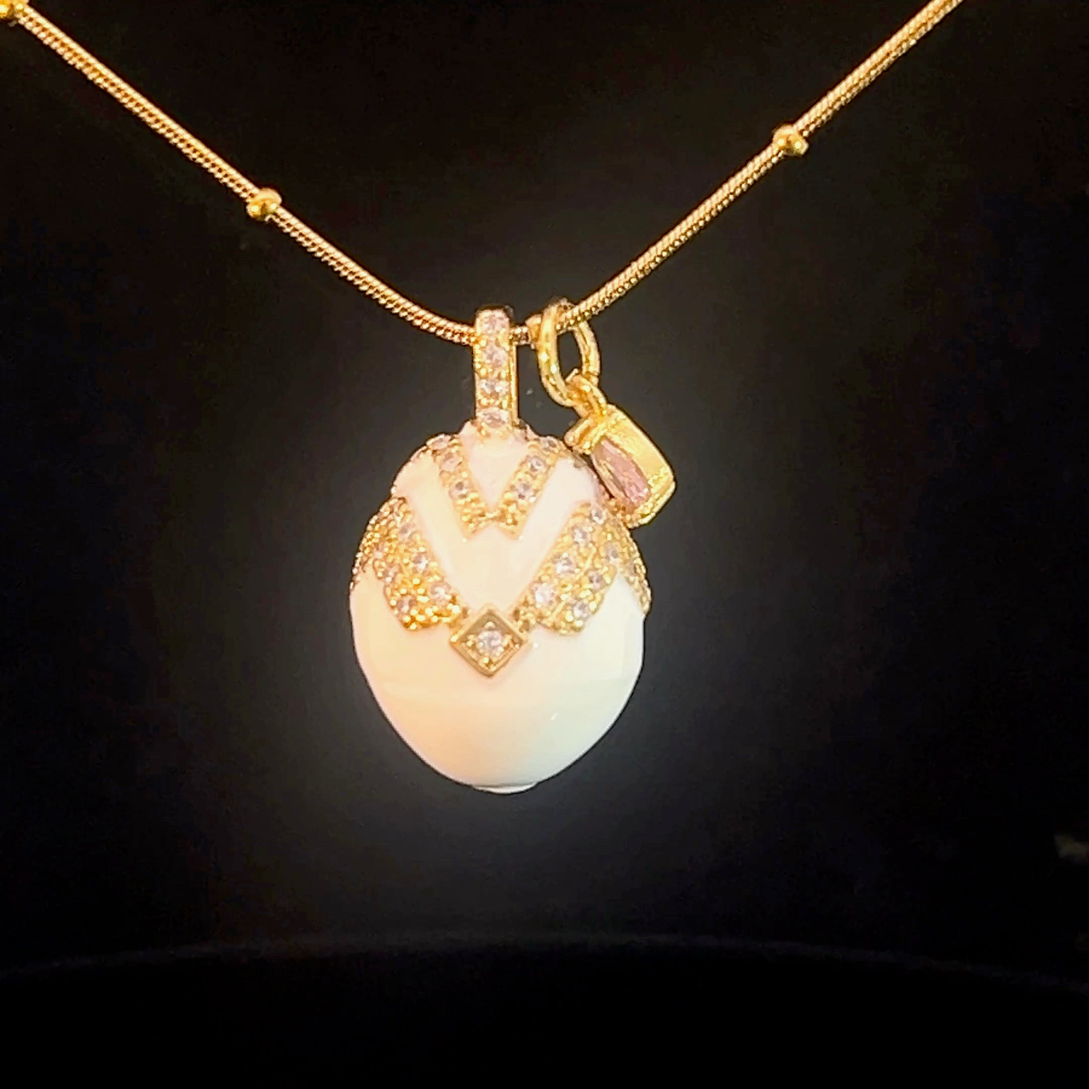 K143 Μενταγιόν